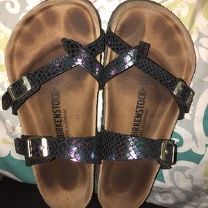 Black snakeskin Birkenstock’s